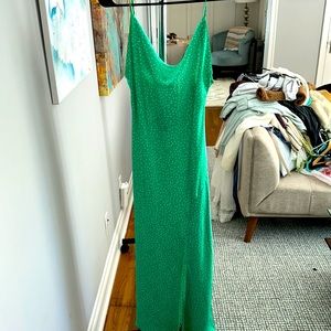 Green and white polka dot silk dress